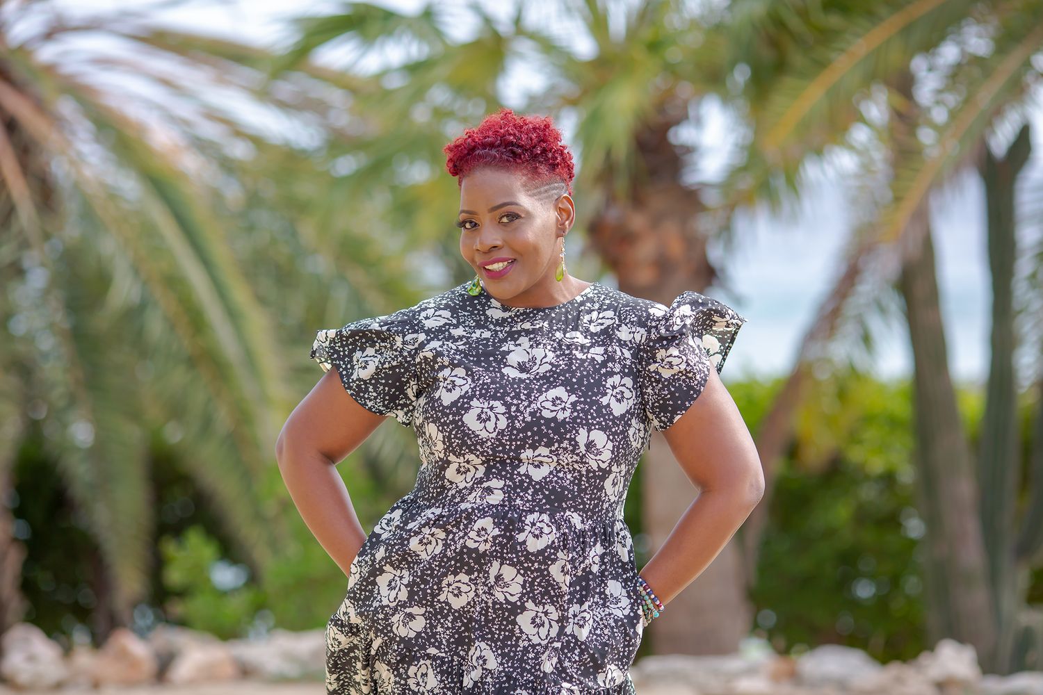 Fashionable female with red hair posing