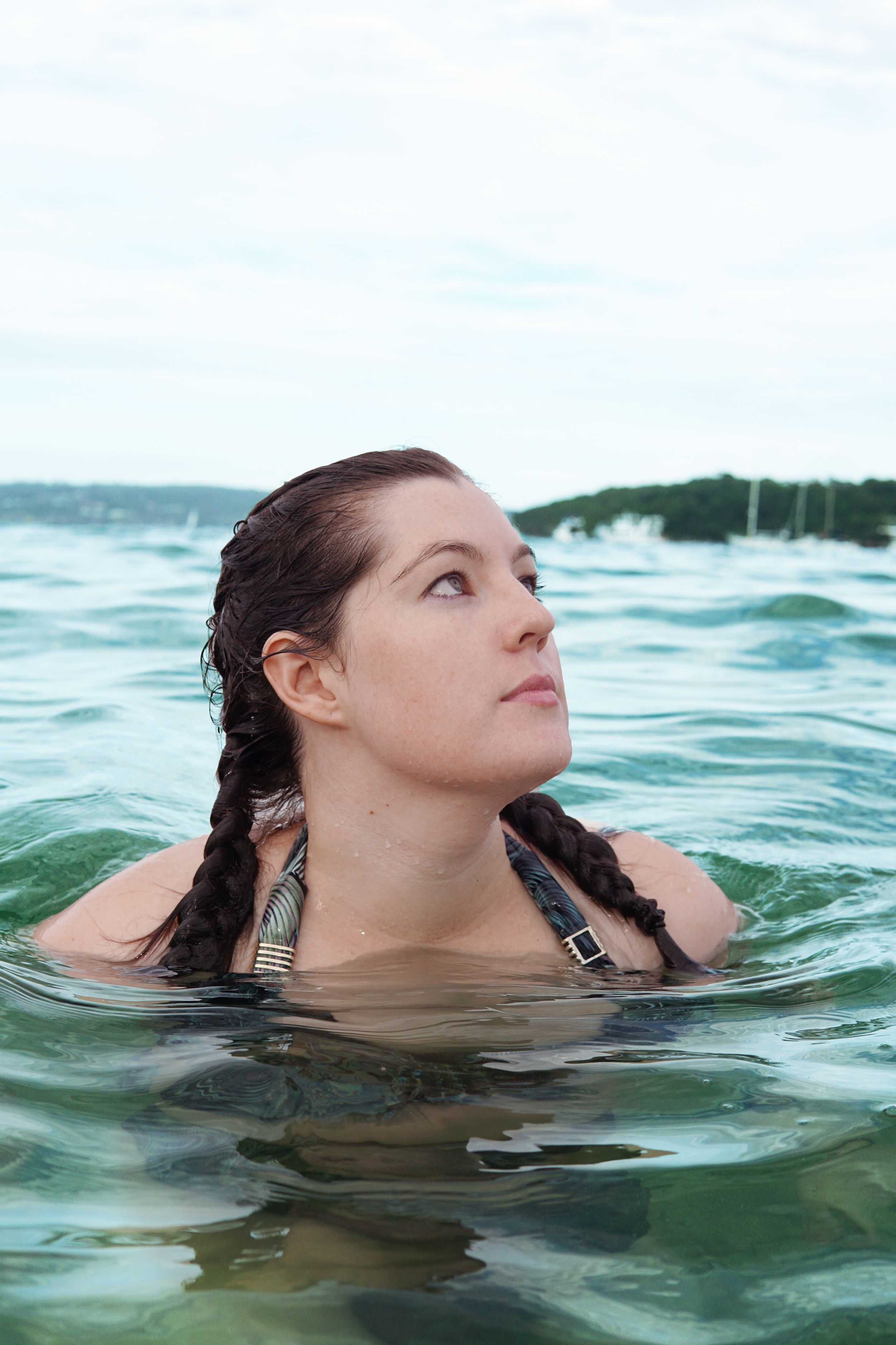 A swimmer enjoying the refreshing ocean waters on a bright summer day.
