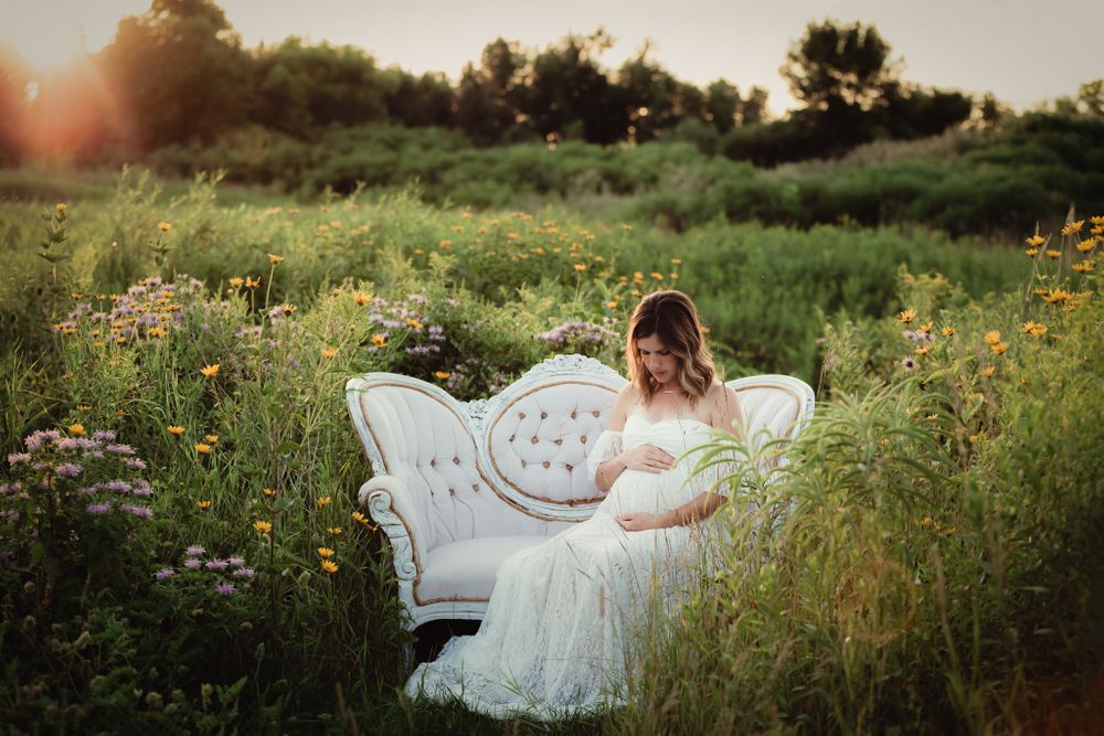 Outdoor maternity session photographed during golden hour