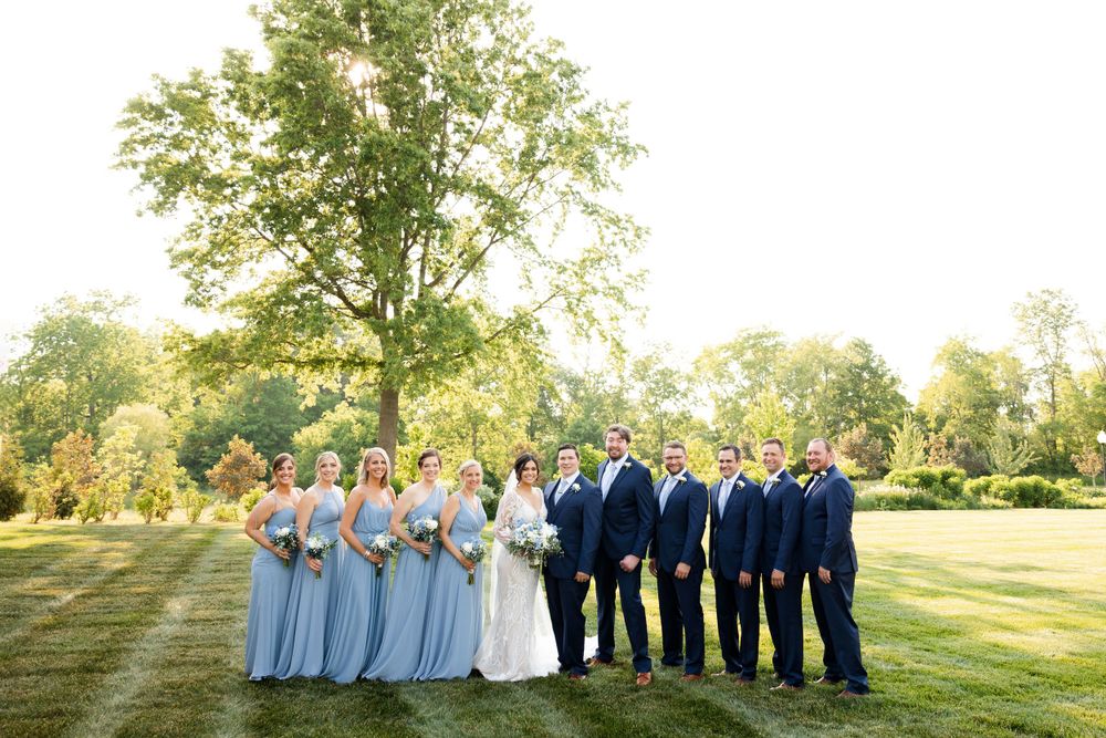 Wedding party outdoors during summer wedding at Jorgensen Farms in Westerville, Ohio.