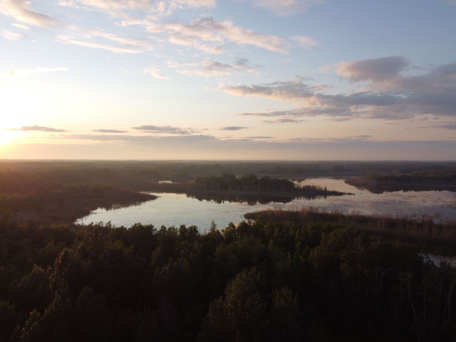 Sunset view from a drone near a lake in Alberta, Canada