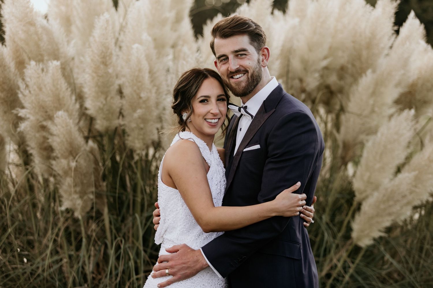 bride and groom cuddling Norfolk