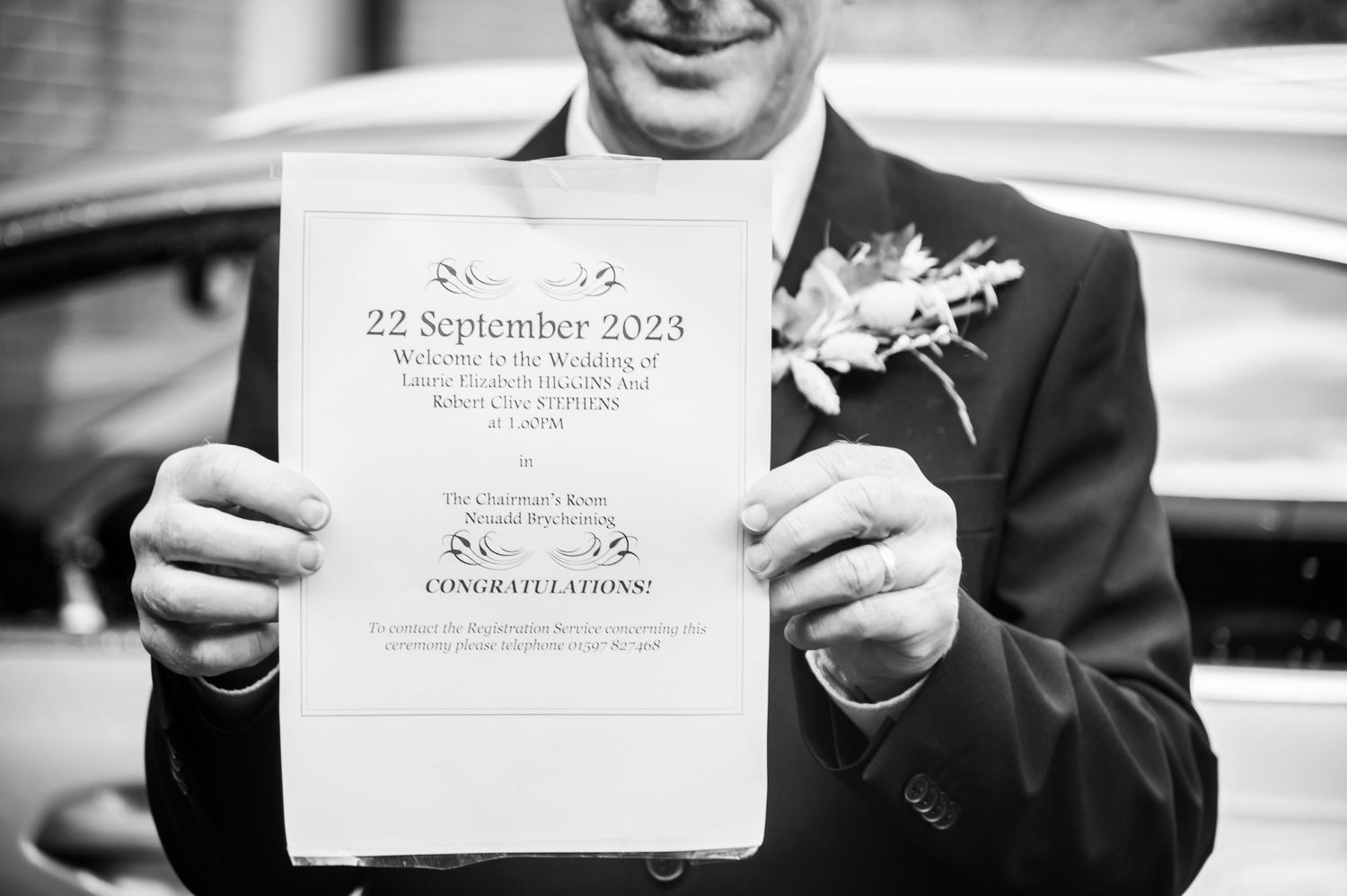 Close up of wedding invitation with September wedding date text.
