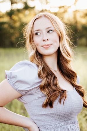 Summer portraits in a gray smocked top with natural lighting and soft expressions.