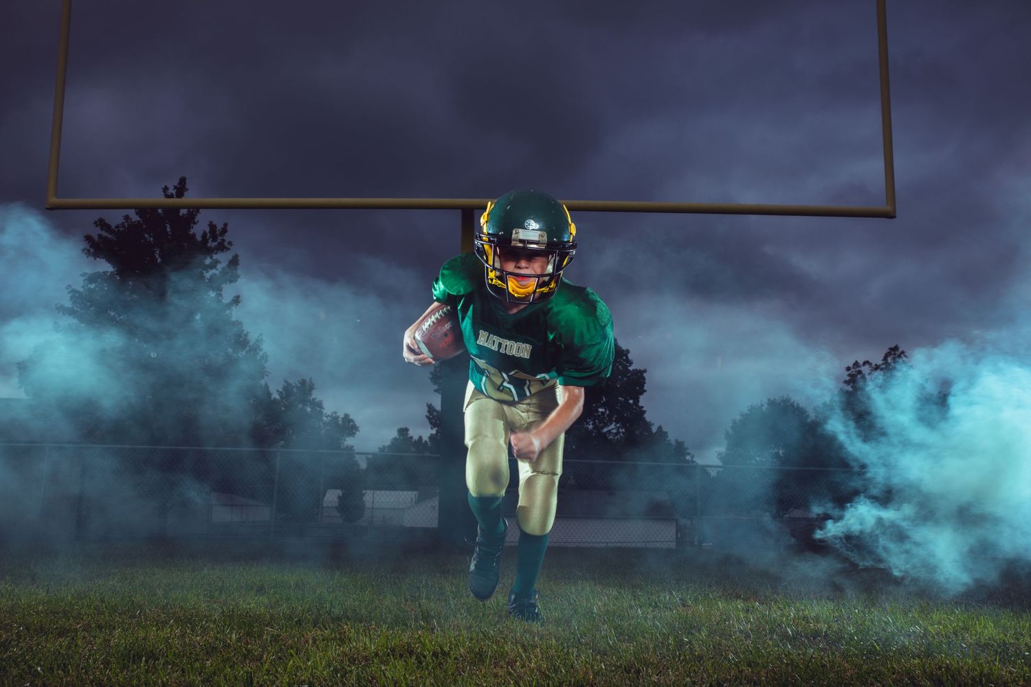A very dramatic and moody portrait of an elementary school football player for Mattoon, Illinois.