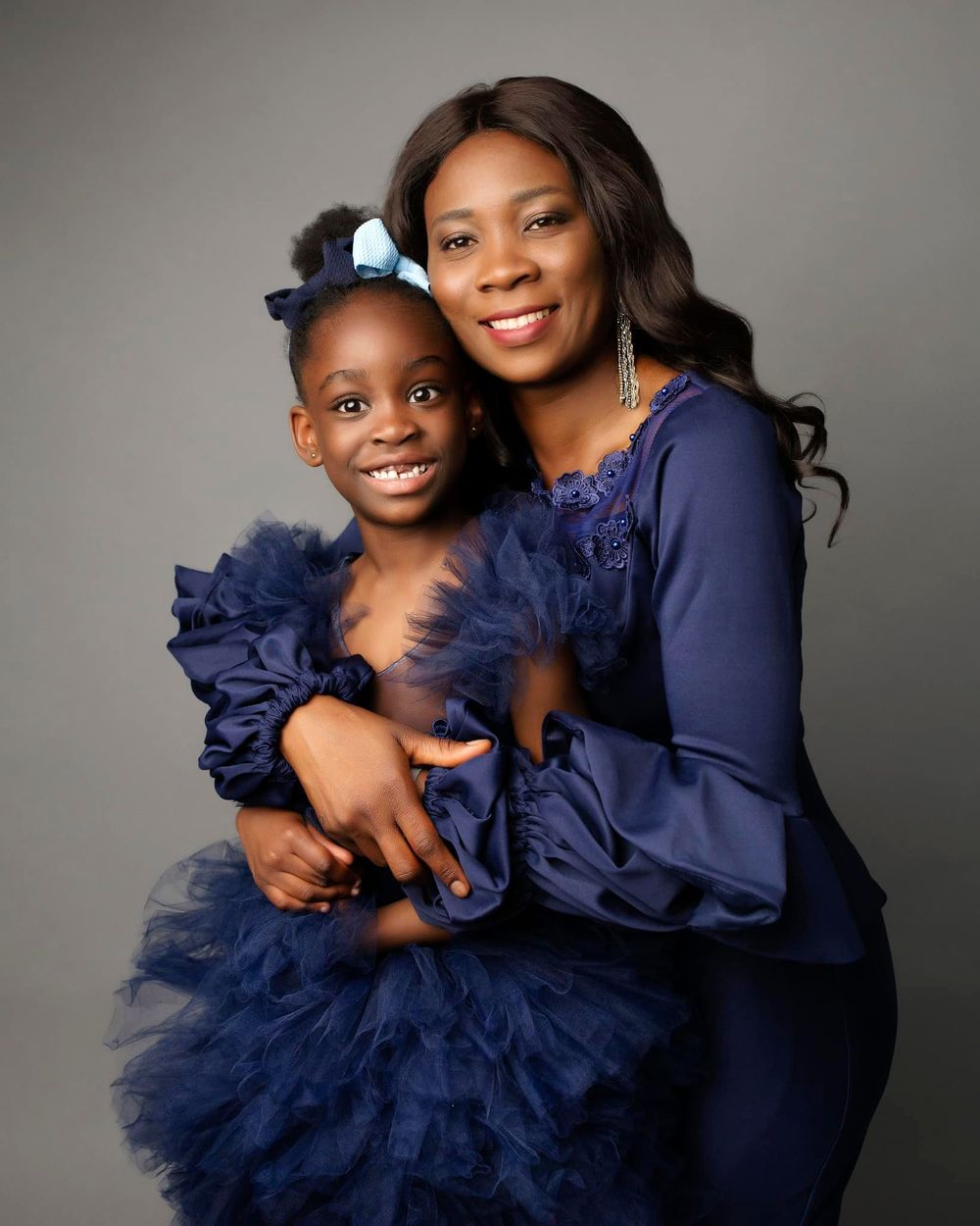 Mum and  young daughter portrait photo