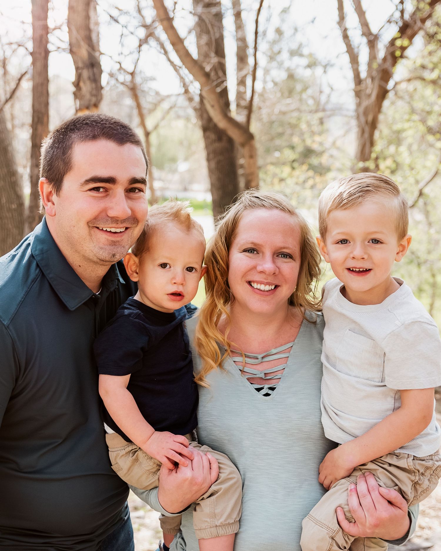 Family smiling for close up portrait at Ross Park in Pocatello, Idaho.