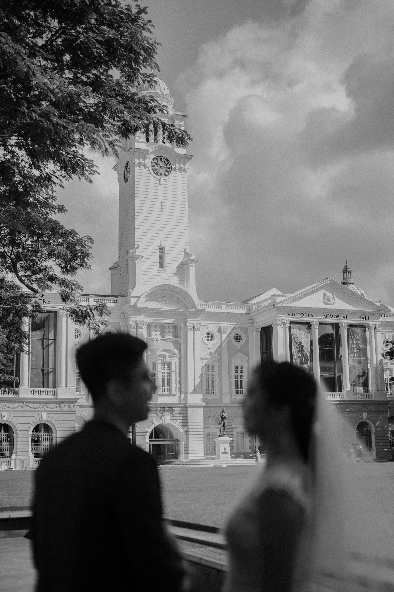 Black and white photograph of a grand historic building with classical architecture.