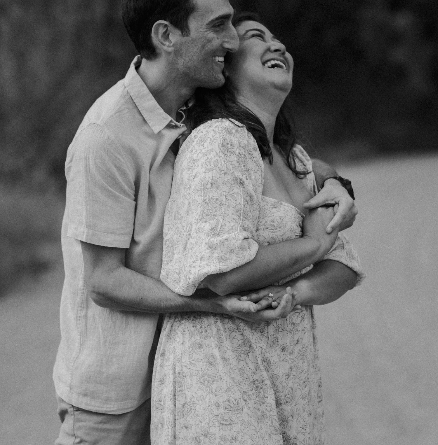 E. Noelle Photography couple engagement in the Los Angeles Malibu hills candid image cuddling laughing
