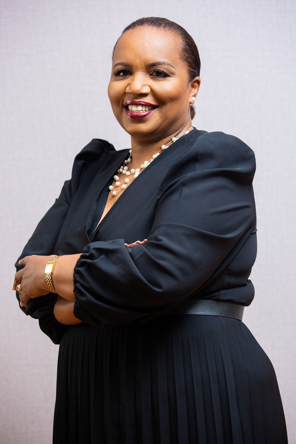 Professional portrait in a structured black dress with elegant jewellery in Nairobi Kenya