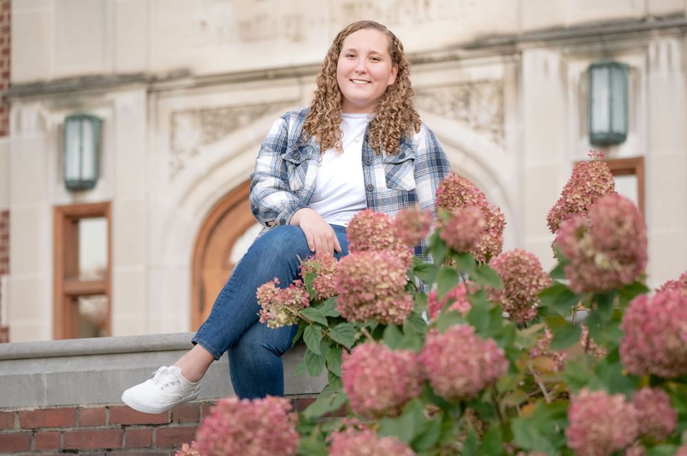 senior girl college campus flowers