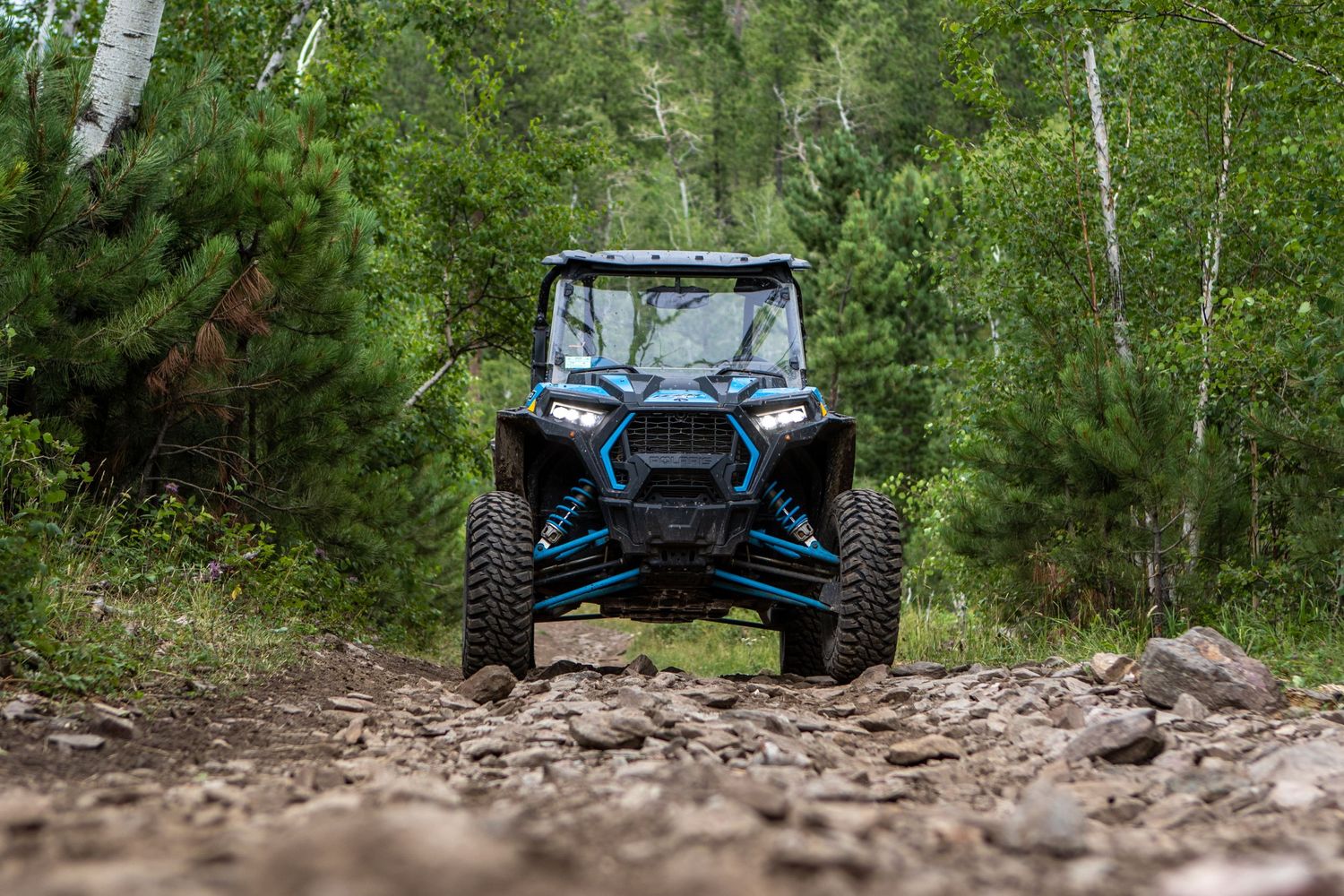 Polaris UTV staged on rocky trail in the Black Hills near Custer, SD.
