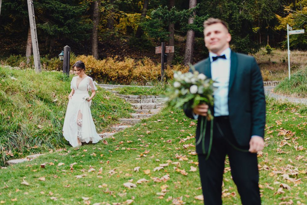 Wedding couple photographed separately in autumn garden setting.