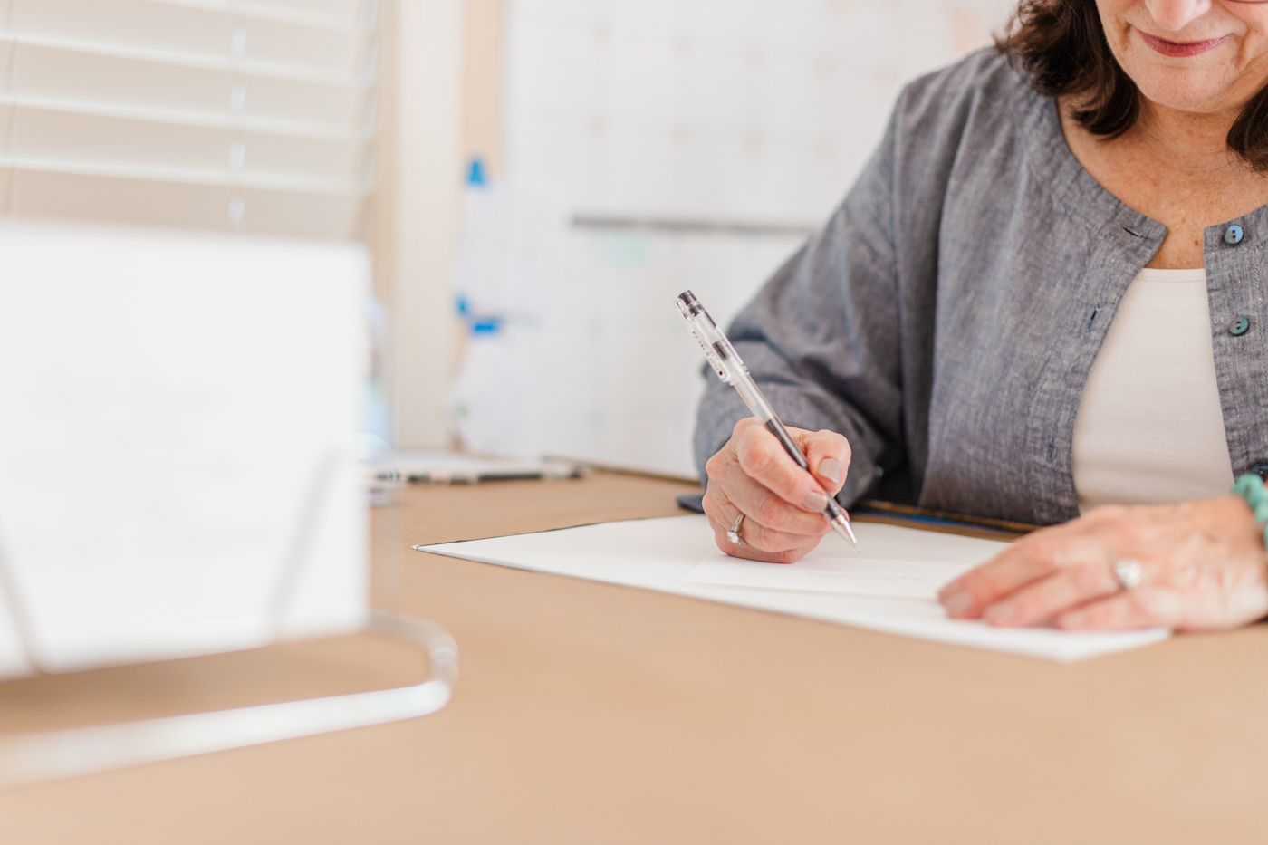Calligrapher writing during a branding Hudson Valley, NY photo session with Danielle Lauren Photography