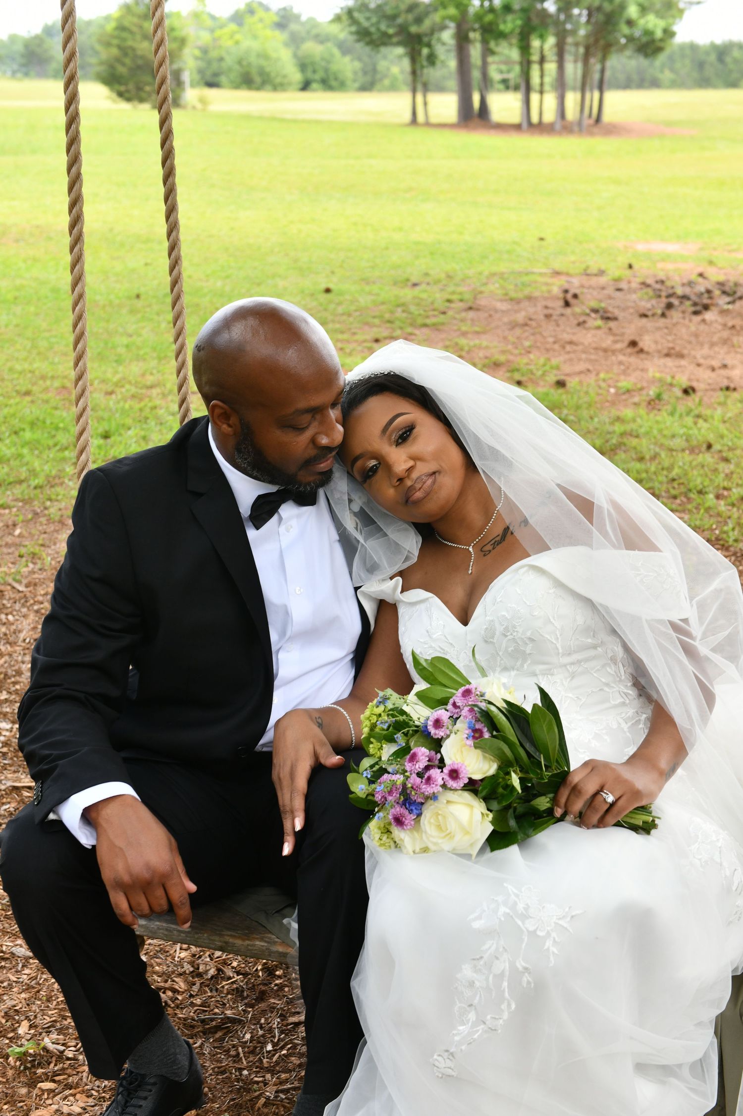 Georgia Wedding Venue- outdoor- swing- love- wedding dress- flowers- field at Sanctuaire Atelier.