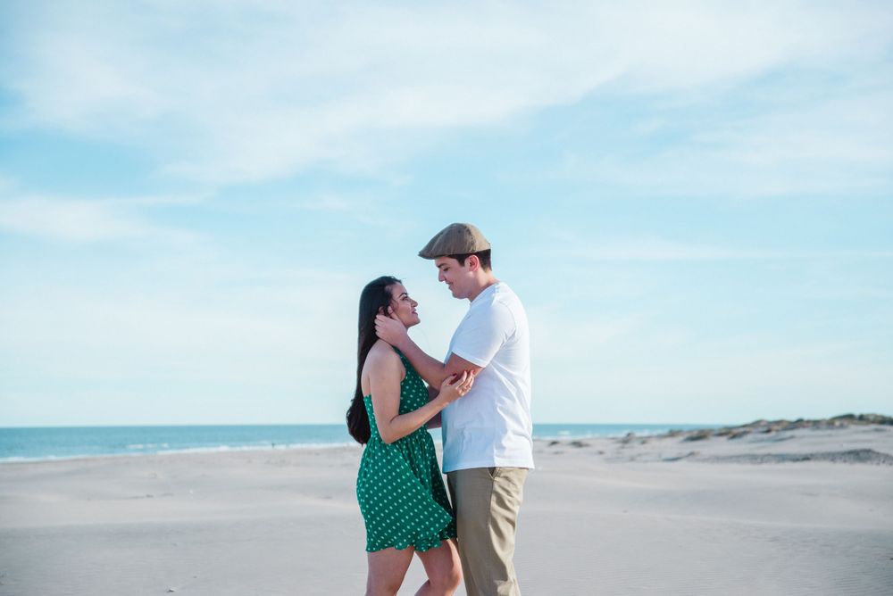 engagement session. couple looking at each other. south padre island. wedding photographer