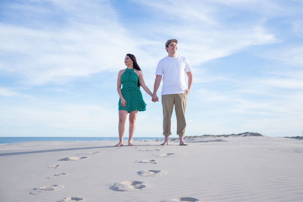 engagement session. couple looking away. south padre island. wedding photographer