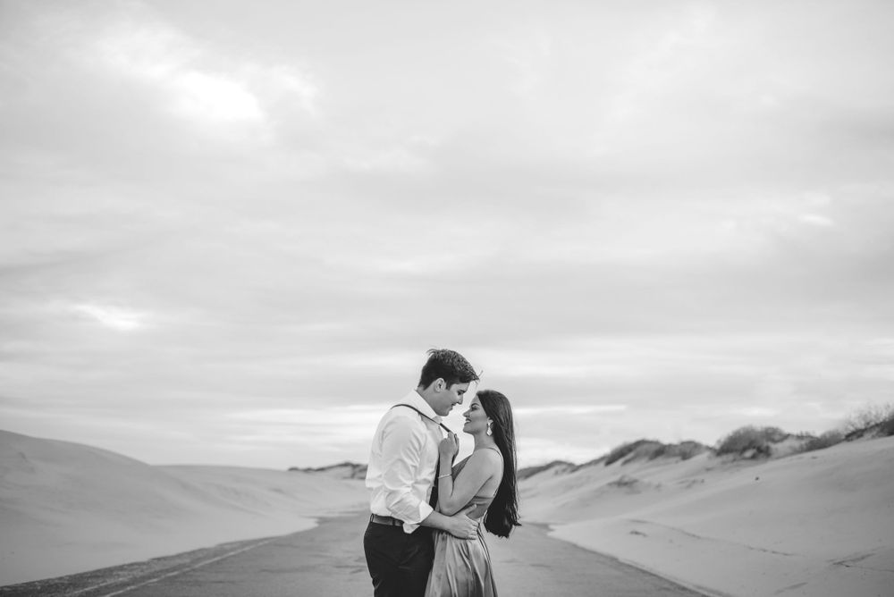 couple in the middle of the road. beach. south padre island. wedding photographer