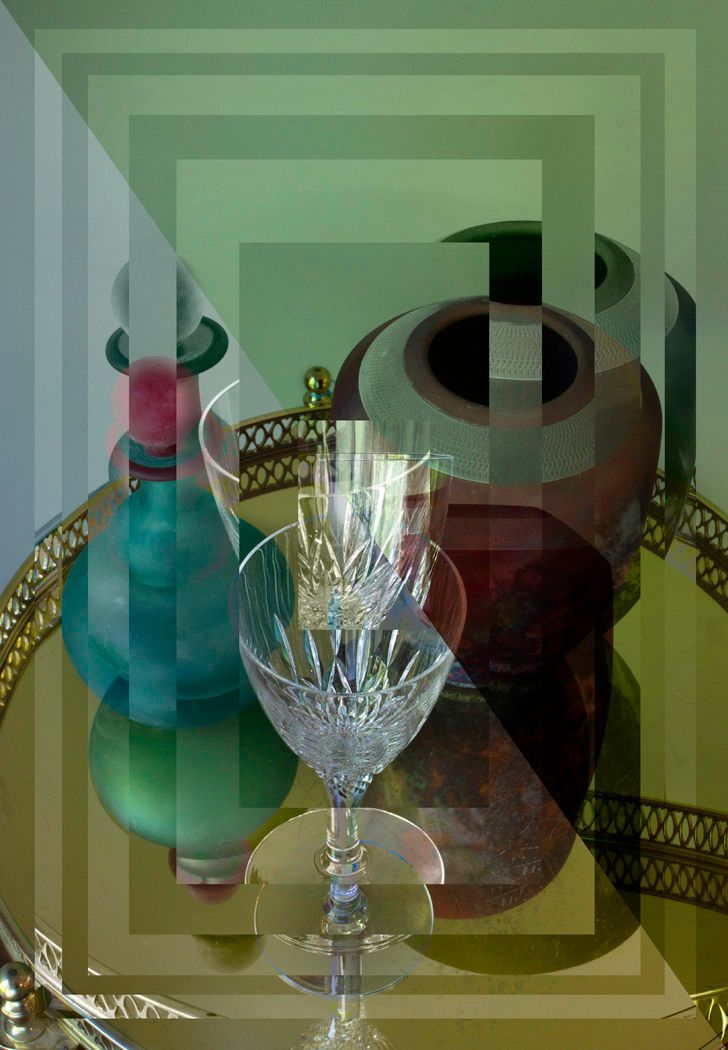 Crystal wine glass with decorative bottles in a green-tinted geometric composition.