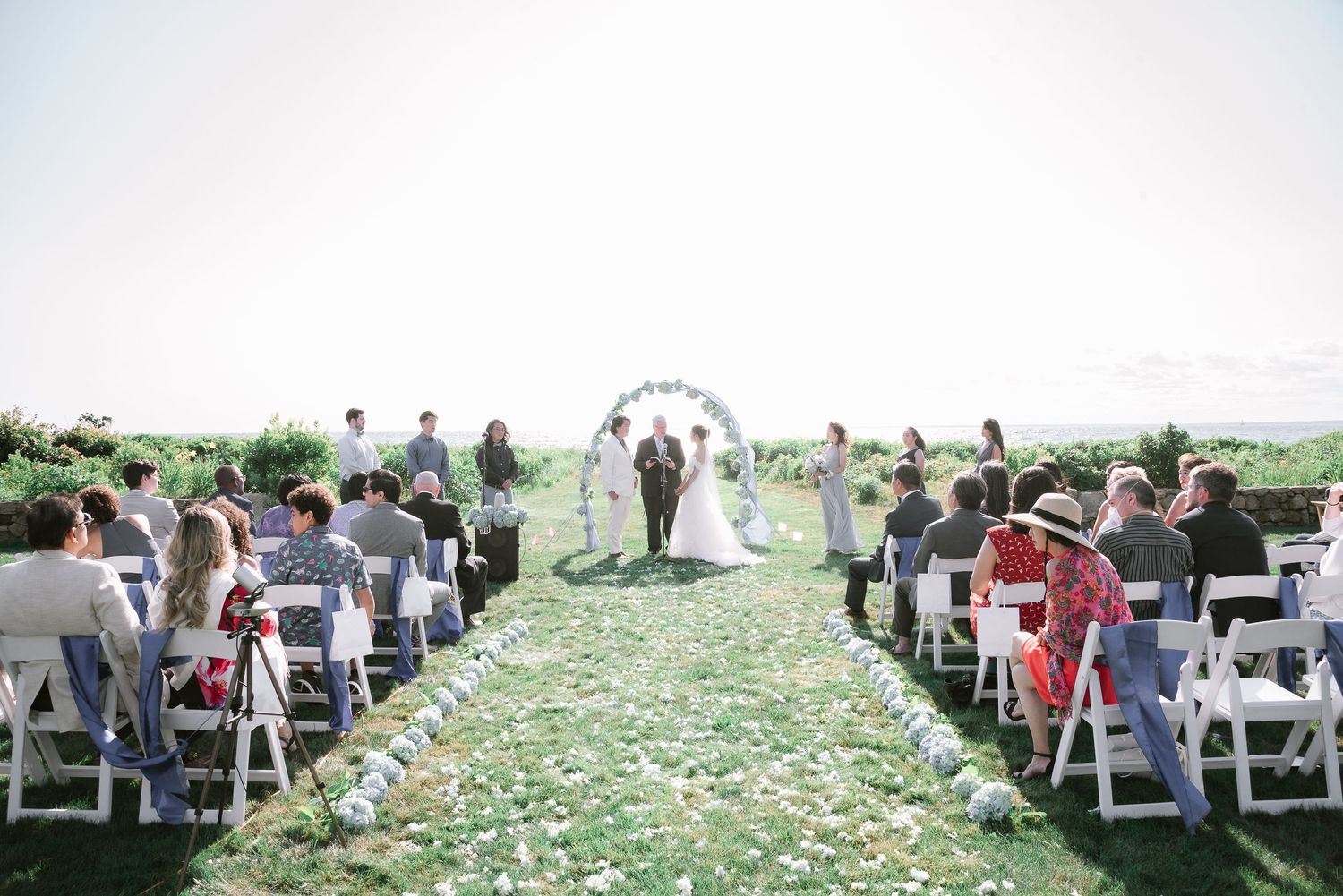 Melodie & Kevin at the altar during their Wedding Ceremony at Cape Cod, MA
