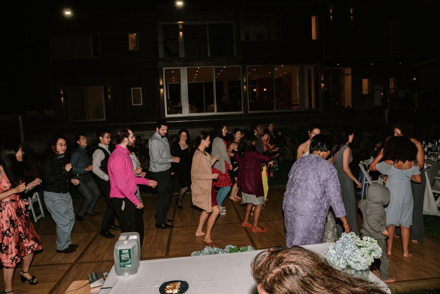 Dance Floor with guests during Melodie & Kevin Wedding Ceremony at Cape Cod, MA