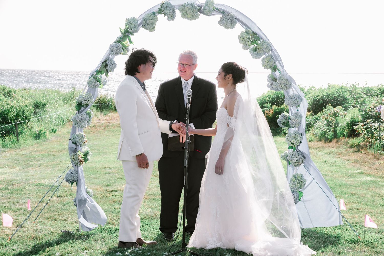 Melodie & Kevin at the altar during their Wedding Ceremony at Cape Cod, MA