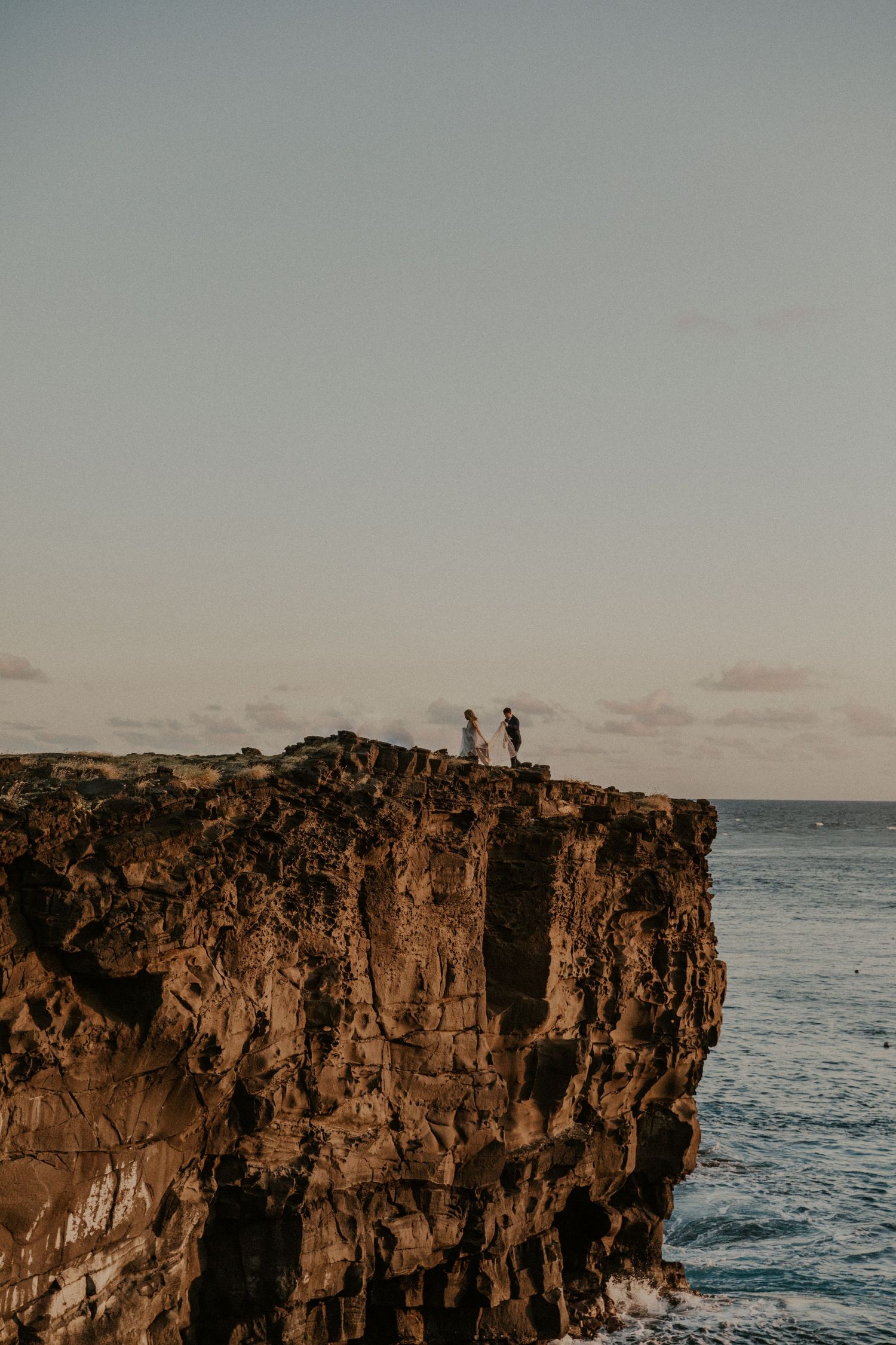 couple getting married on a cliff in Hawaii