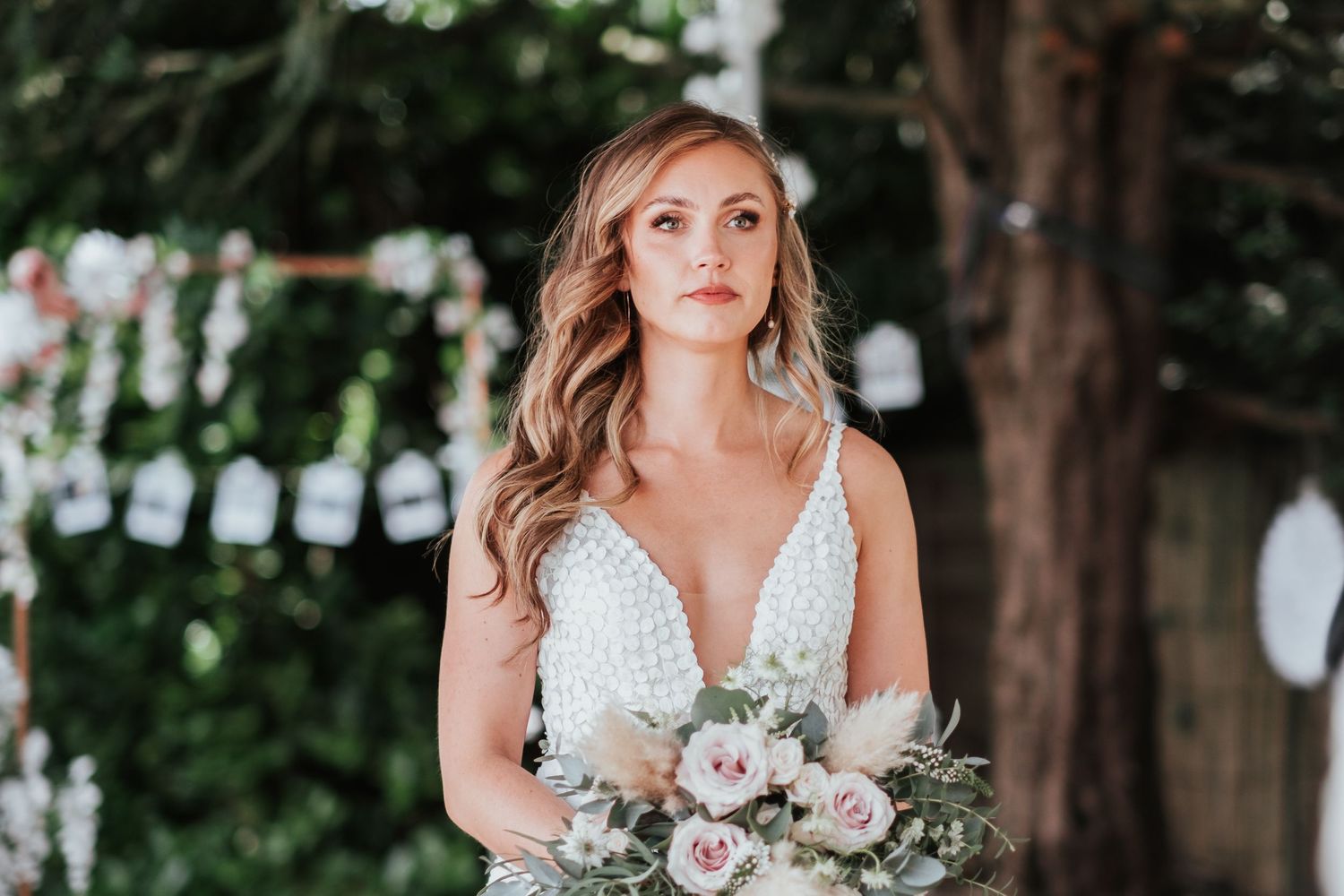 Bride at the altar listening intently at intimate home wedding Lichfield