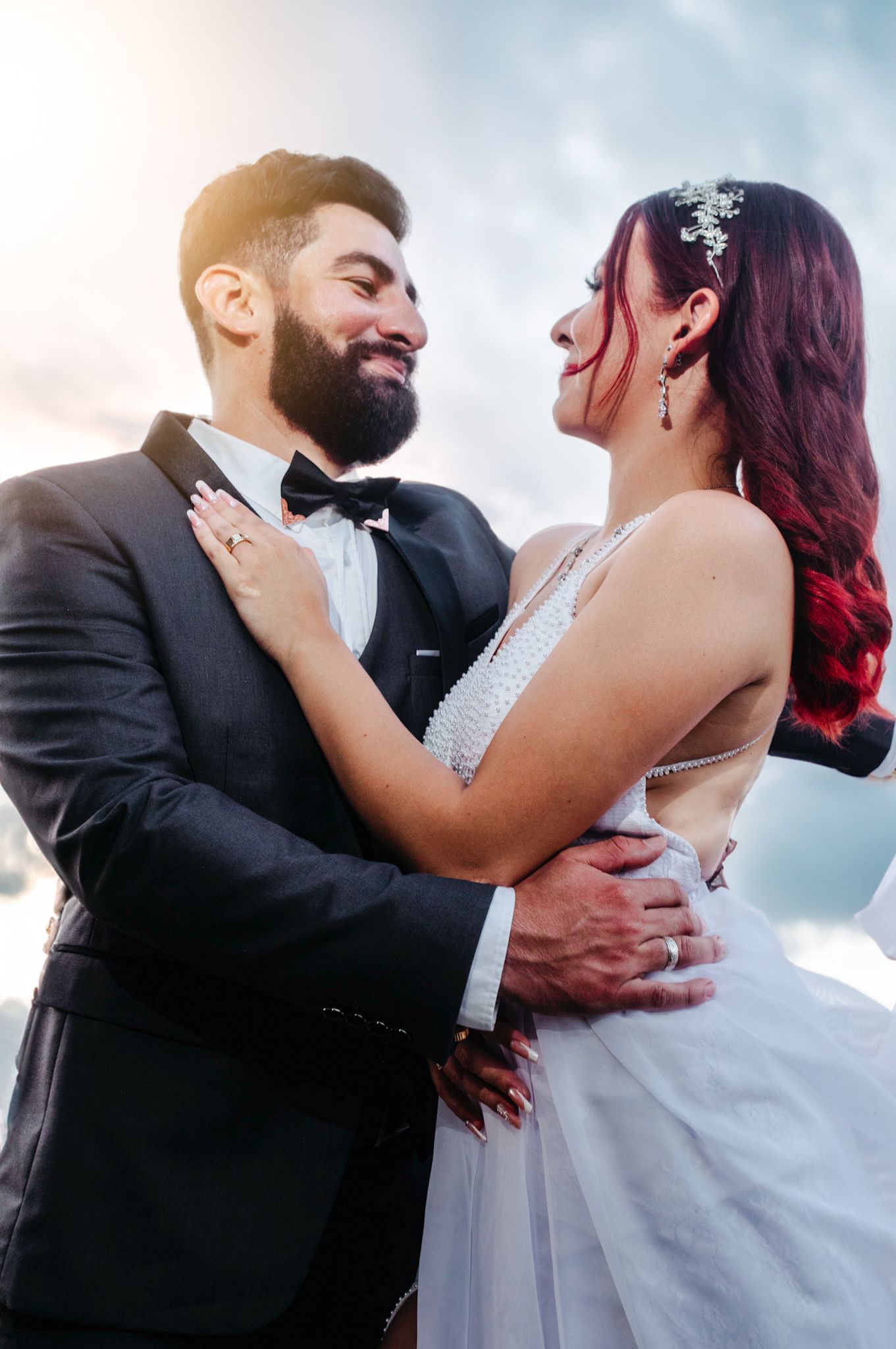 Ethereal Wedding with sky backdrop and white dress bride with cobalt blue suit groom in Irving Texas