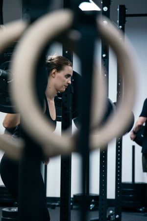 lifting kettle bells at gym