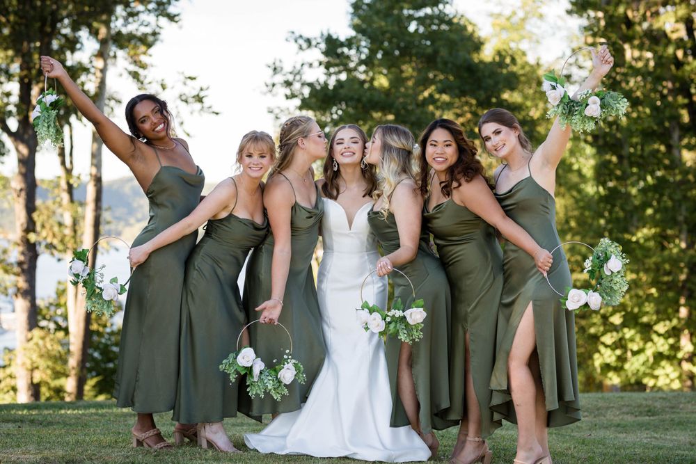 Bride with bridesmaids in olive dresses at a Eureka Springs, Arkansas wedding
