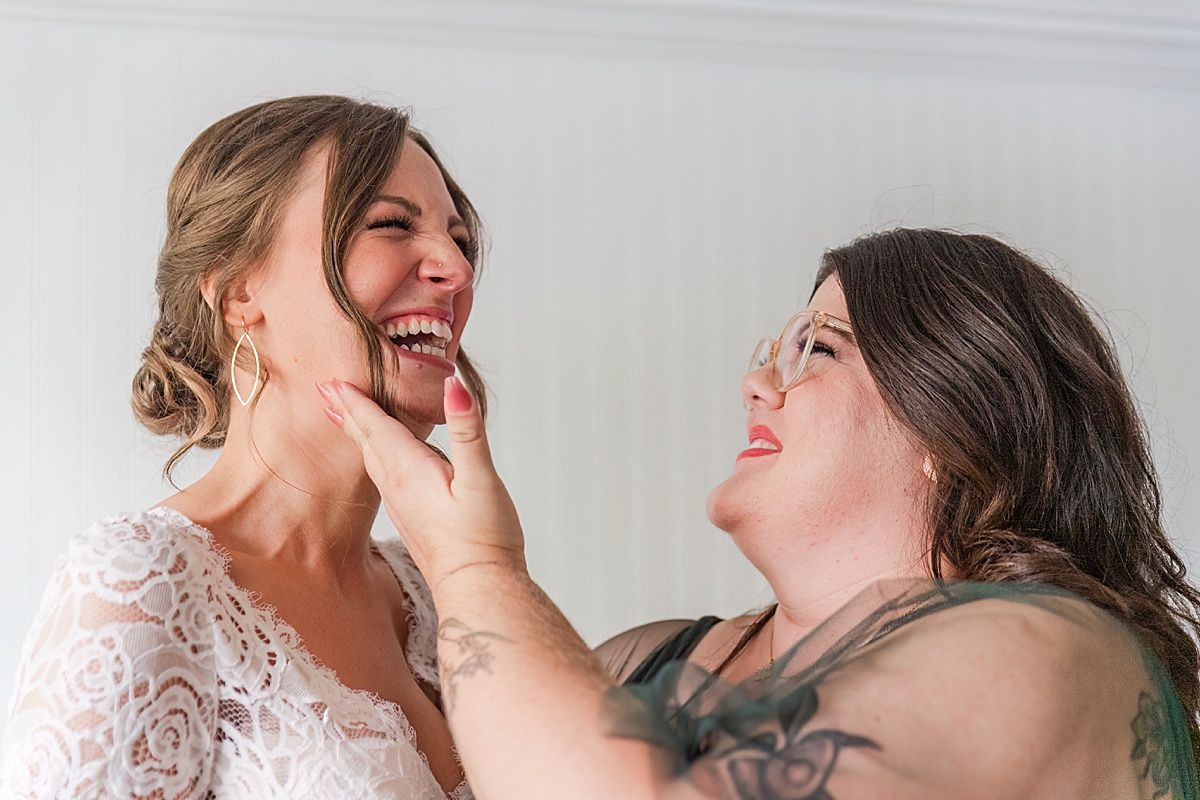 Laughing bride and maid of honor