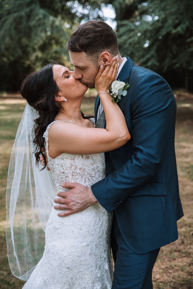 Bride and groom kissing