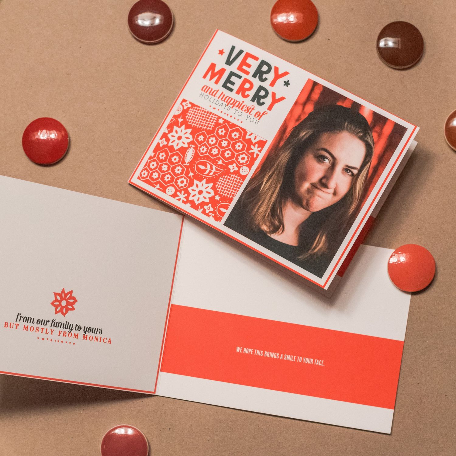 Red and white holiday card design with 'Very Merry' text and decorative snowflake pattern.