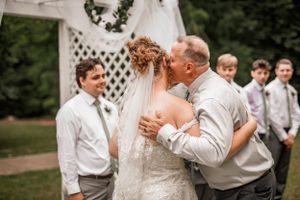 Mid summer wedding located inside the Donald Davis arboretum in Auburn Alabama