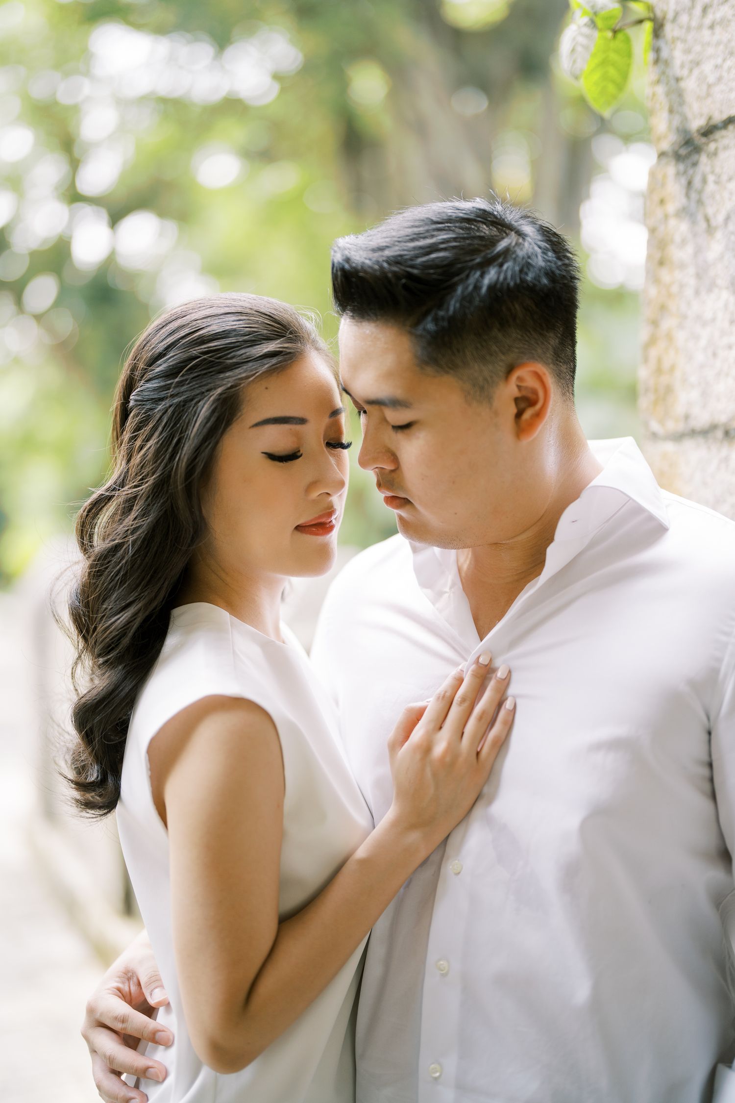 Romantic close-up portrait with soft natural lighting and dreamy bokeh effect.