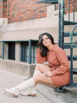 branding photo of a girl in Downtown McKinney in her cowboy boots