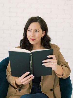 Girl looking with Book - Branding Session in Plano, TX
