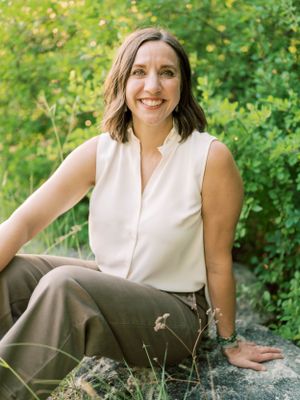 Woman smiling - outdoor headshots