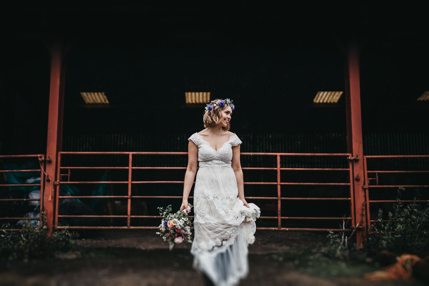 boho bride in farm yard
