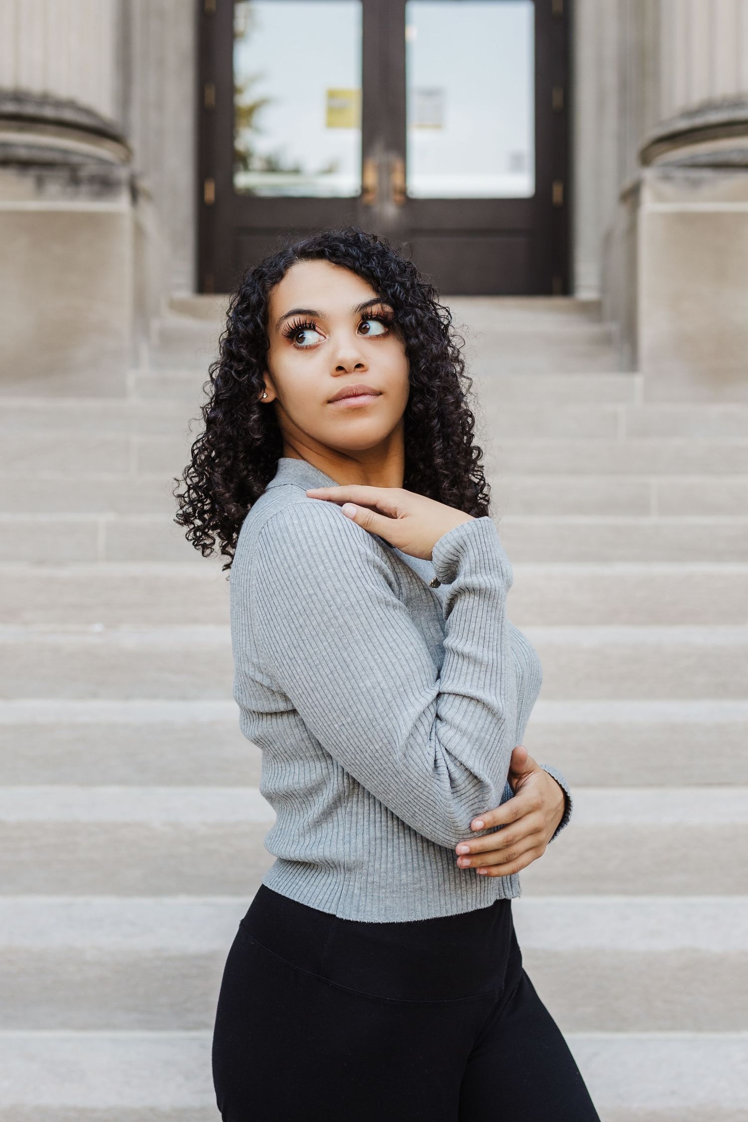 senior photography in downtown Iowa City voxman music auditorium and parking garage sage and ivy studio