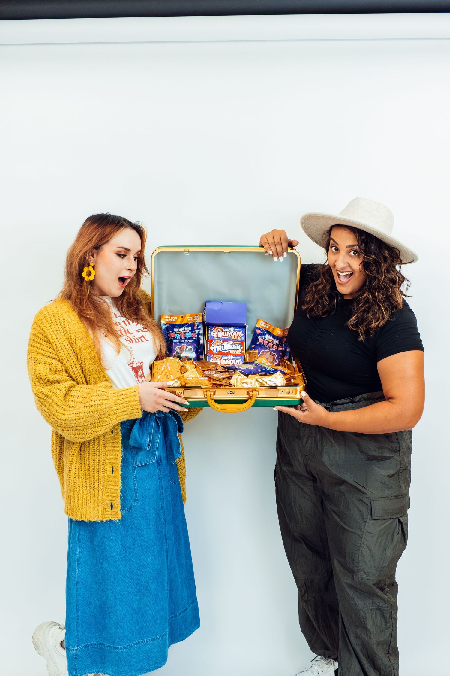Two female models showcasing product promotion taken by eric aaberg