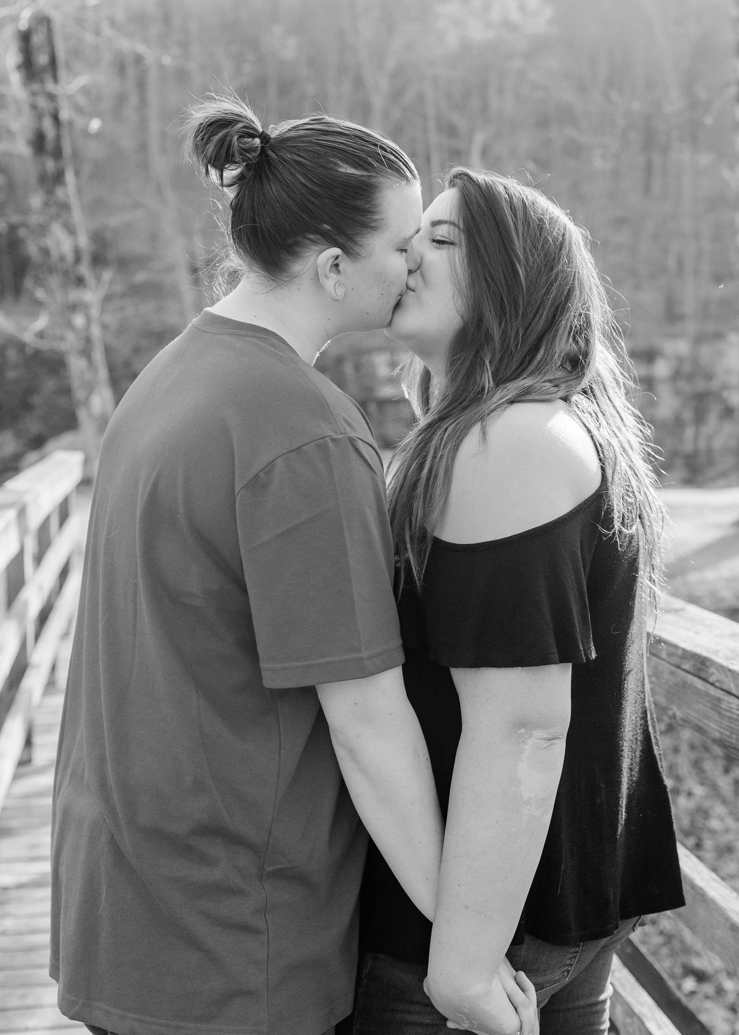 Black and white romantic portraits capture intimate moments between a couple.