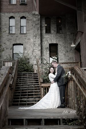 spokane wedding at chetau rive bride and groom hugging photographer luba wold