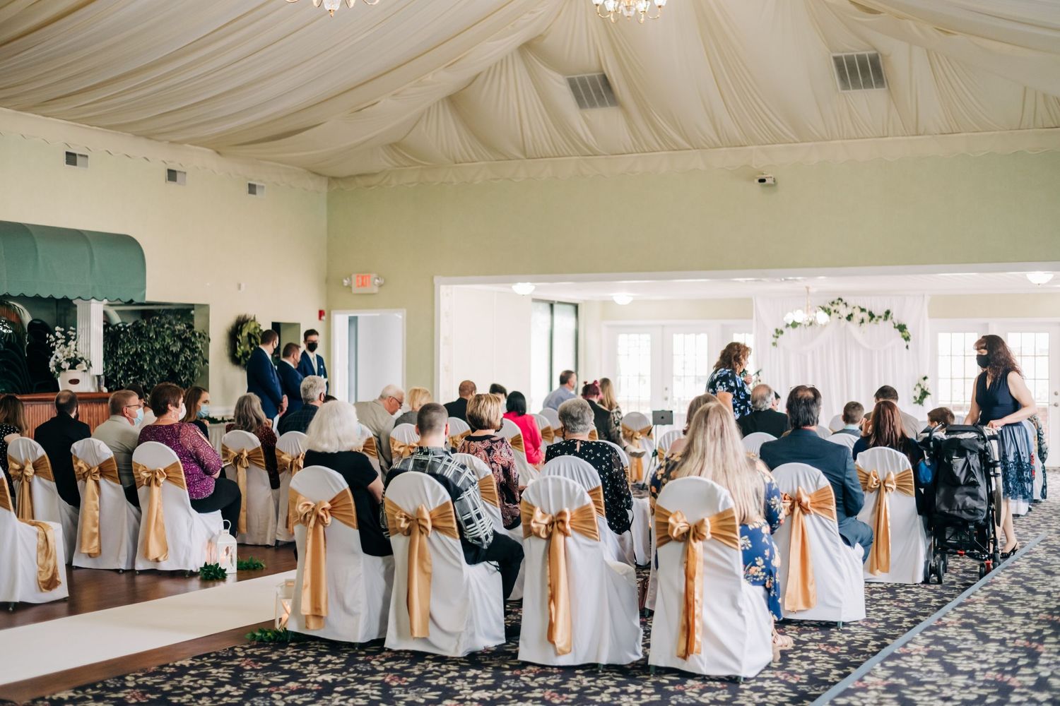 photo of guests sitting down at wedding ceremony