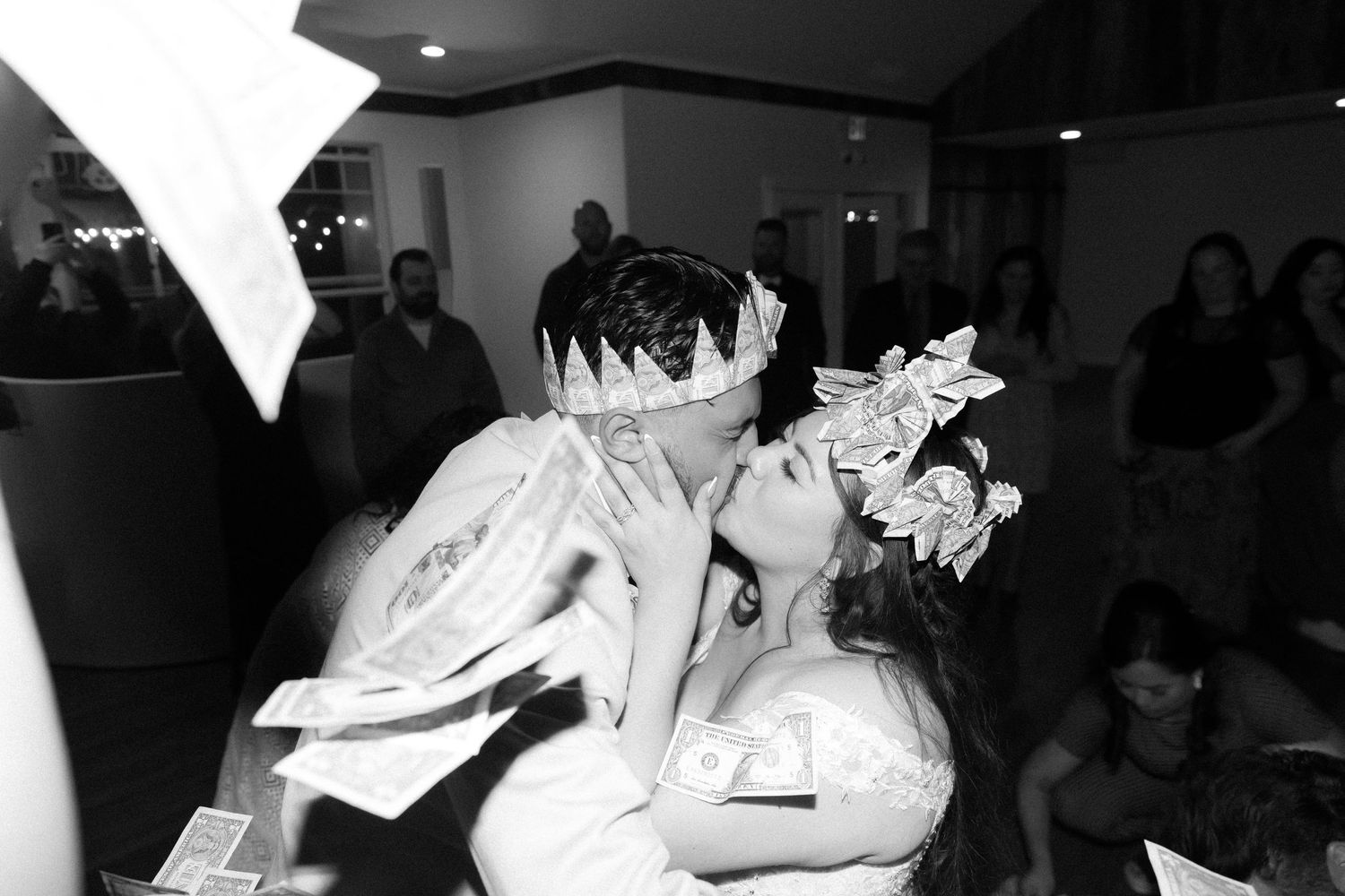 Bride and groom kissing during reception