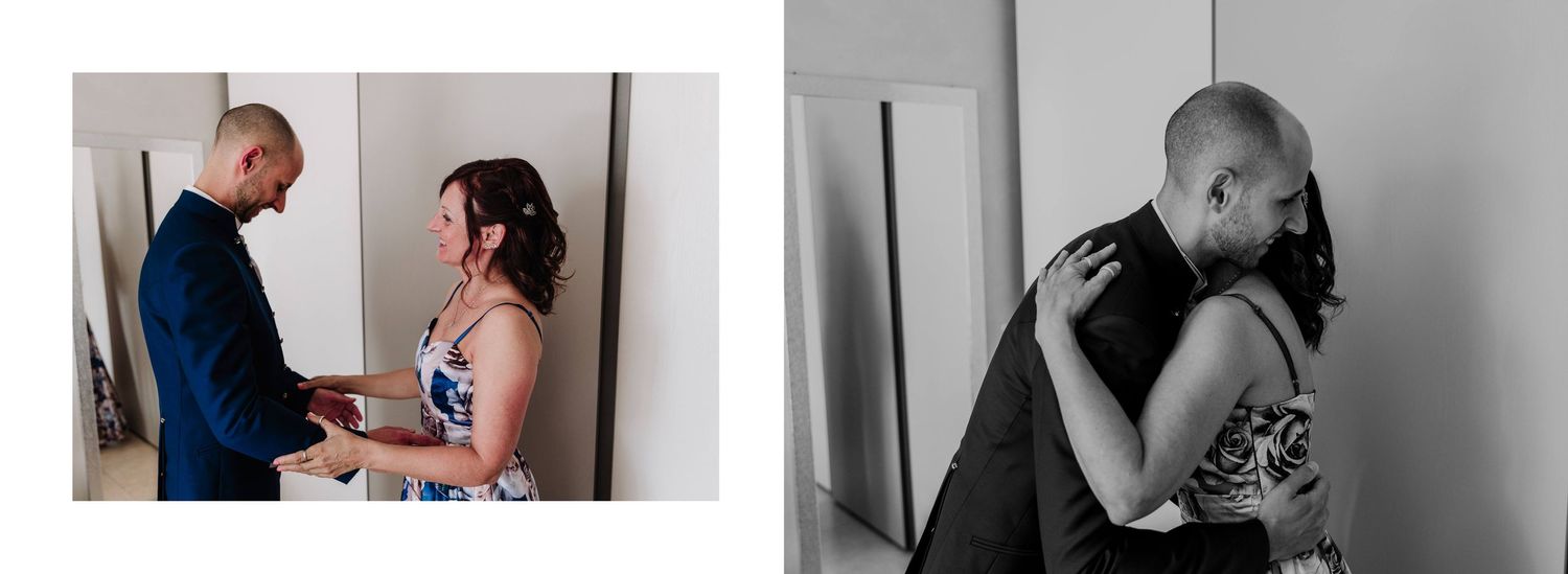 Emotional black and white wedding preparation moment with groom sharing a heartfelt hug before the ceremony.