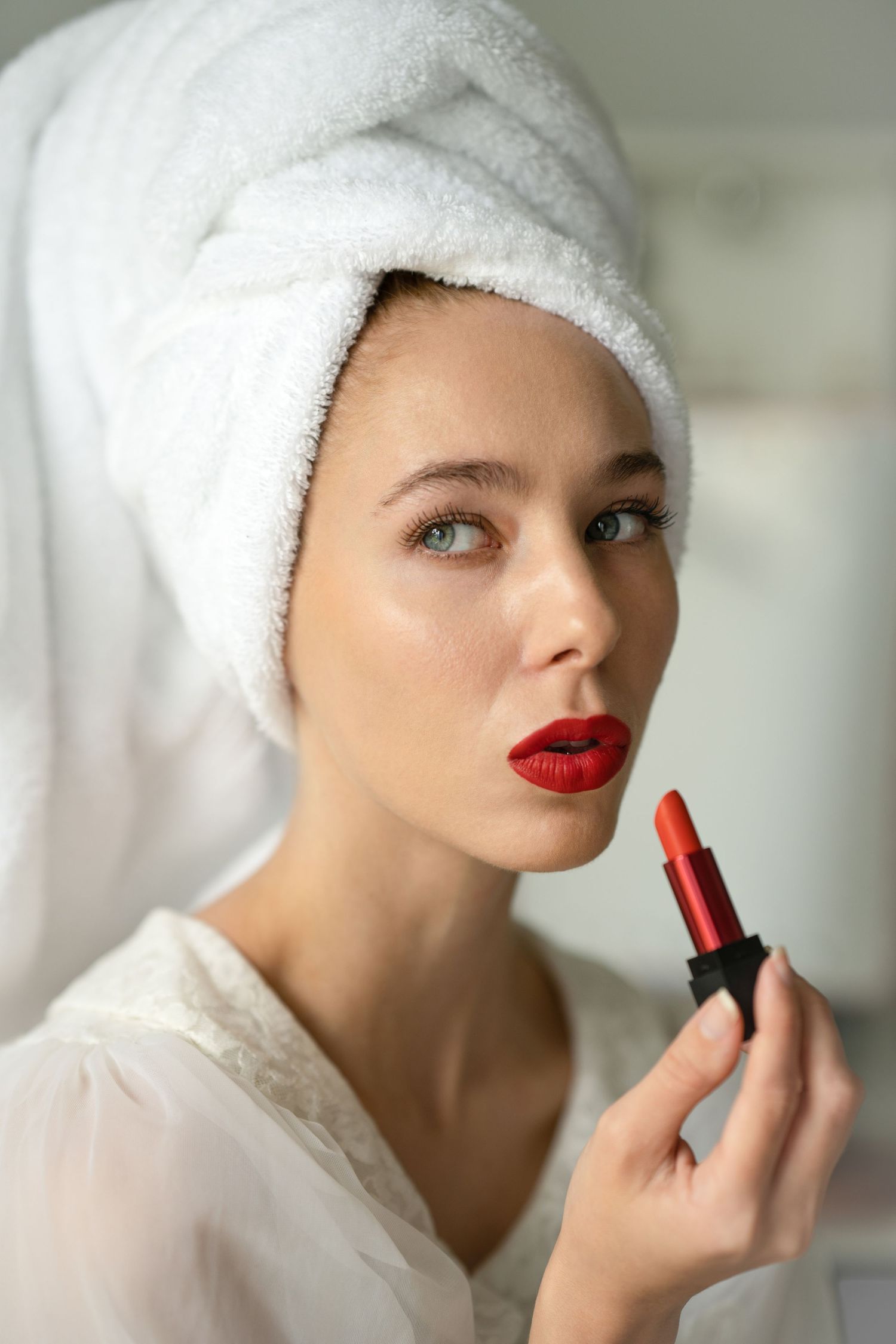 Professional beauty portrait featuring flawless makeup and studio lighting.