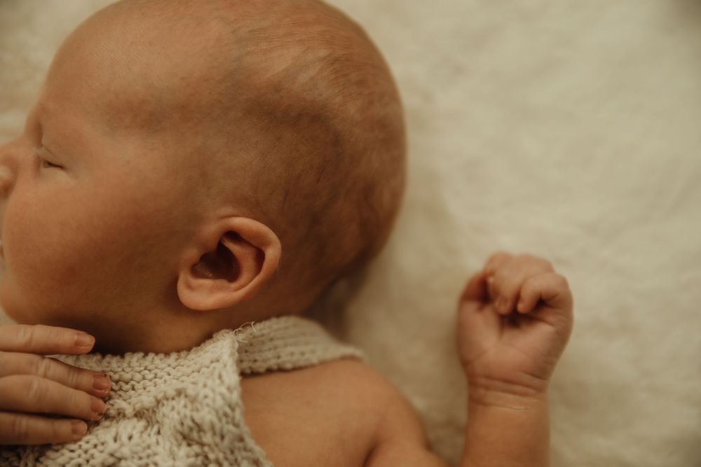 Newborn baby closeup ear