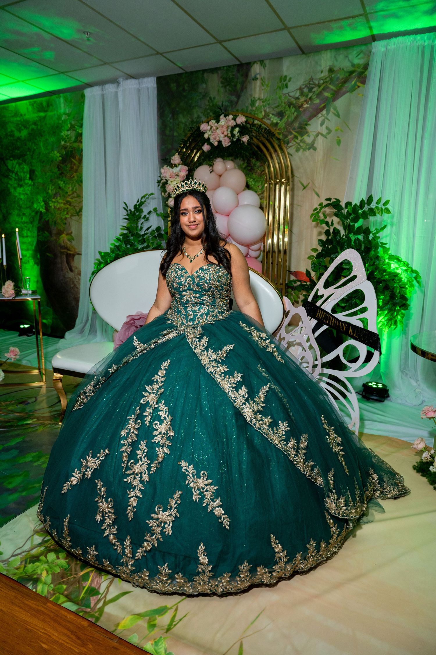 Beautiful forest green ball gown with metallic embellishments shown in multiple angles.